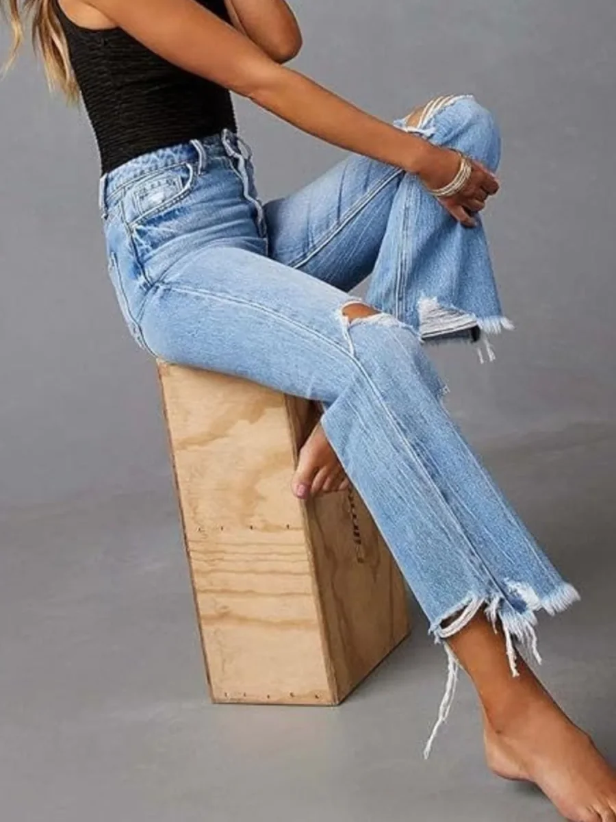 Jeans med slidte, rå kant og flare - Billede 3